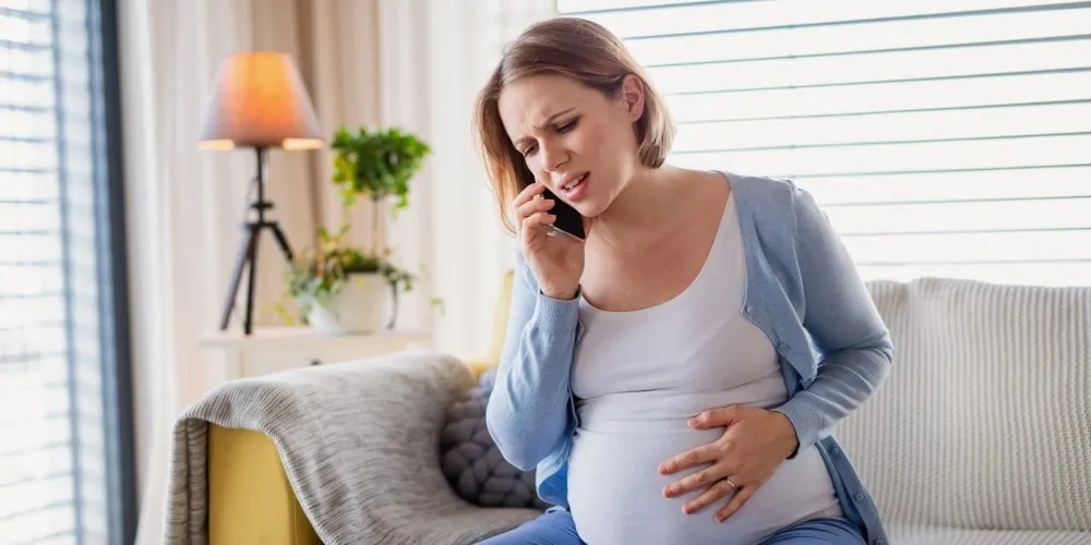 Pregnant woman on the phone